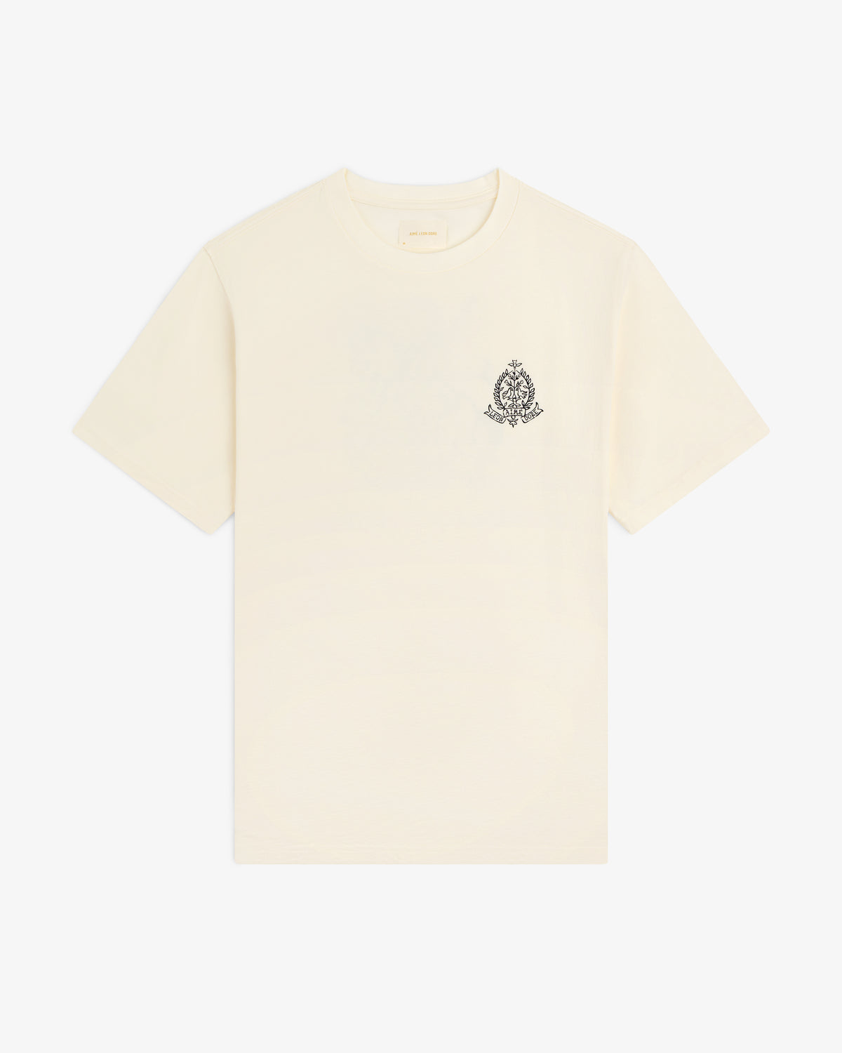 Saint George Graphic Tee: cream short-sleeve t-shirt with a small black ornate crest on the upper left chest.