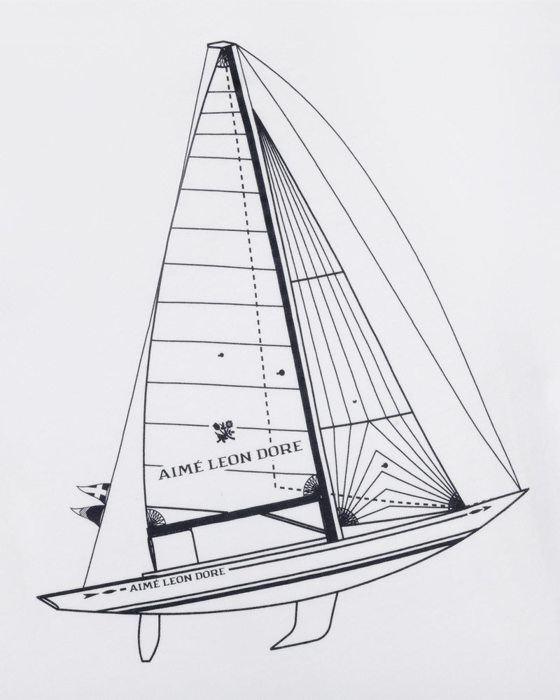 Black line sailboat drawing with Aime Leon Dore text on sail and hull, on white Marina Tee.