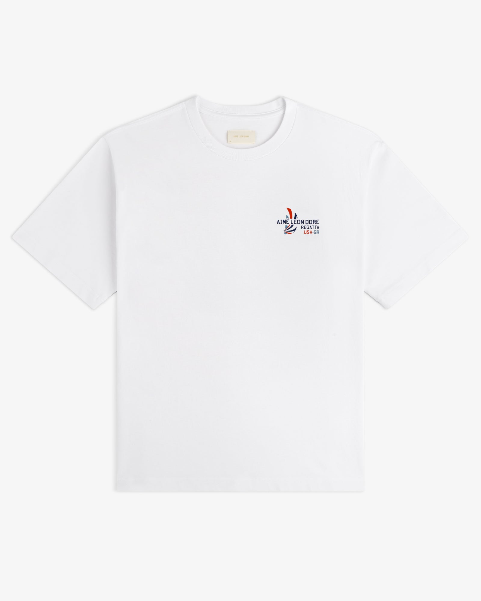 Regatta Tee in white with a small Aimé Leon Dore logo and graphic on the left chest.