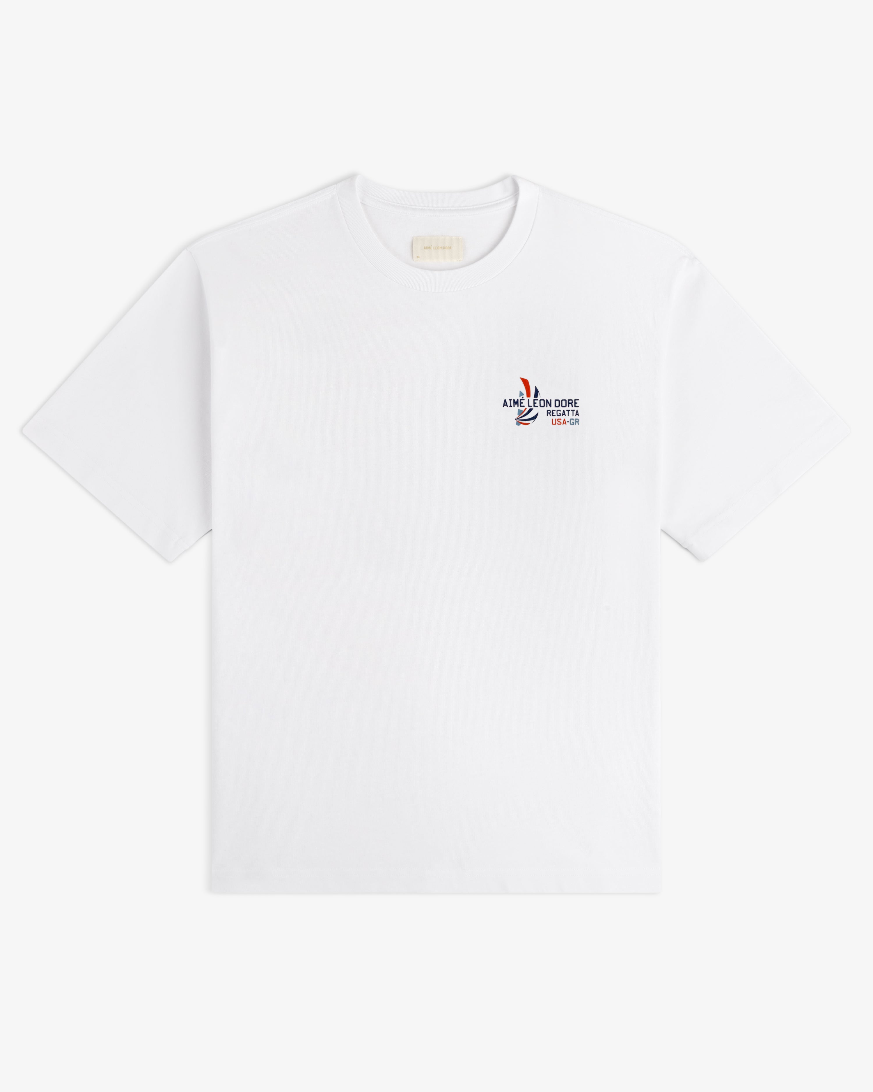 Regatta Tee in white with a small Aimé Leon Dore logo and graphic on the left chest.