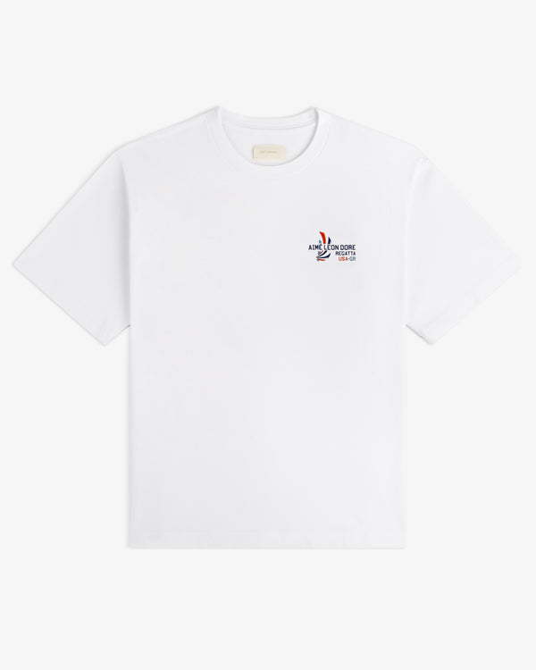 Regatta Tee in white with a small Aimé Leon Dore logo and graphic on the left chest.