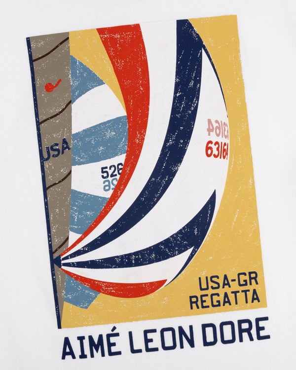 The Regatta Tee features a bold graphic sailboat print with USA-GR Regatta and AIMÉ LEON DORE text underneath.