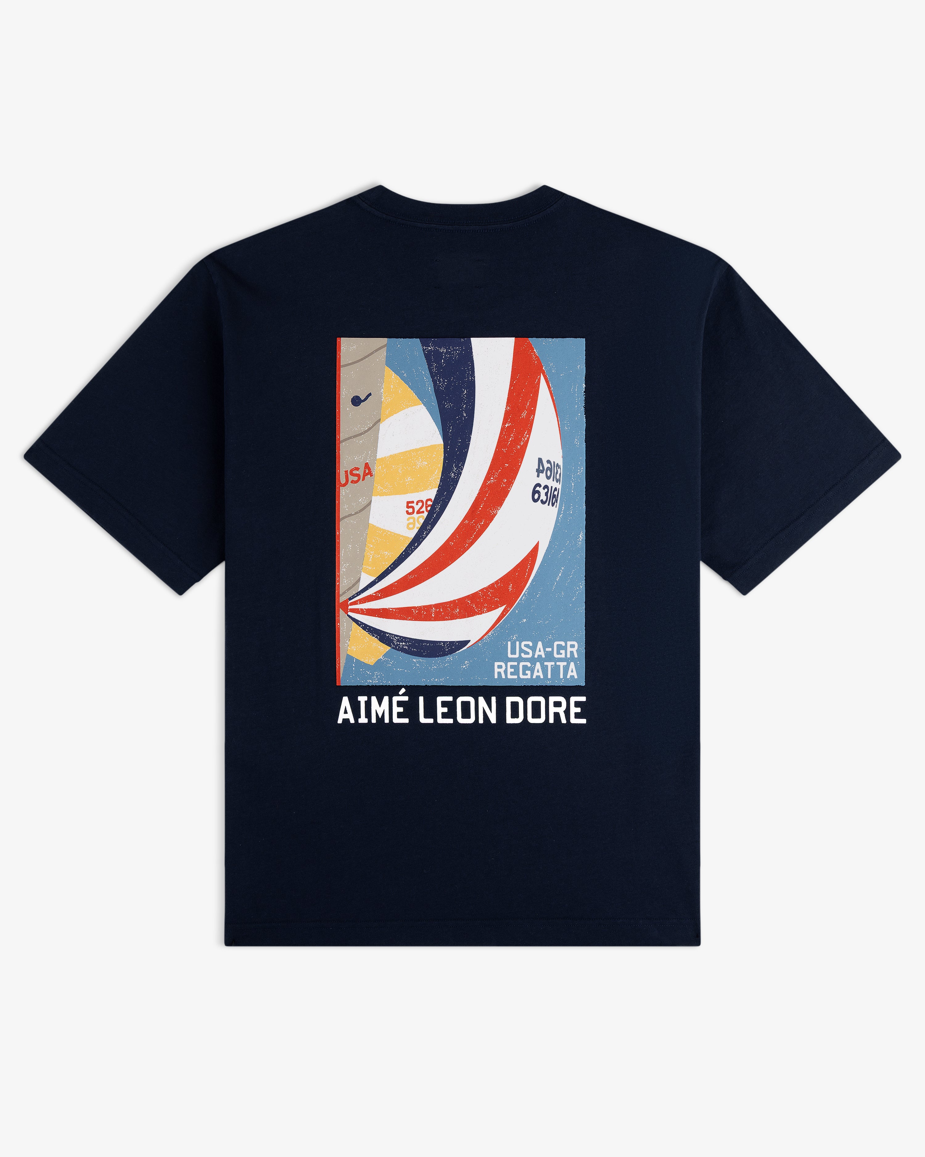 Regatta Tee in navy with a colorful sailboat regatta graphic and “AIMÉ LEON DORE USA-GR REGATTA” on the back.