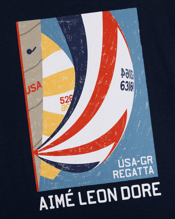 Graphic of colorful sailboats with "Regatta Tee" text on a textured blue background.
