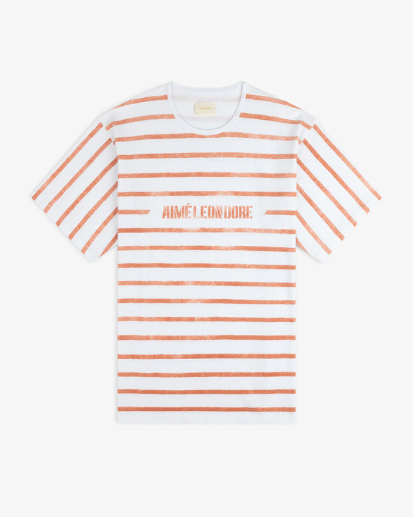 Slub Beach Tee: white shirt with horizontal red stripes and AIMÉ LEON DORE printed in red across the chest.