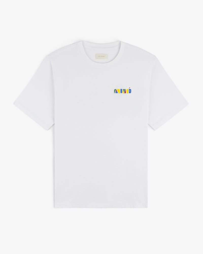 Stacked Logo Tee in white with a small, colorful geometric AMI logo on the left chest, laid flat on white.