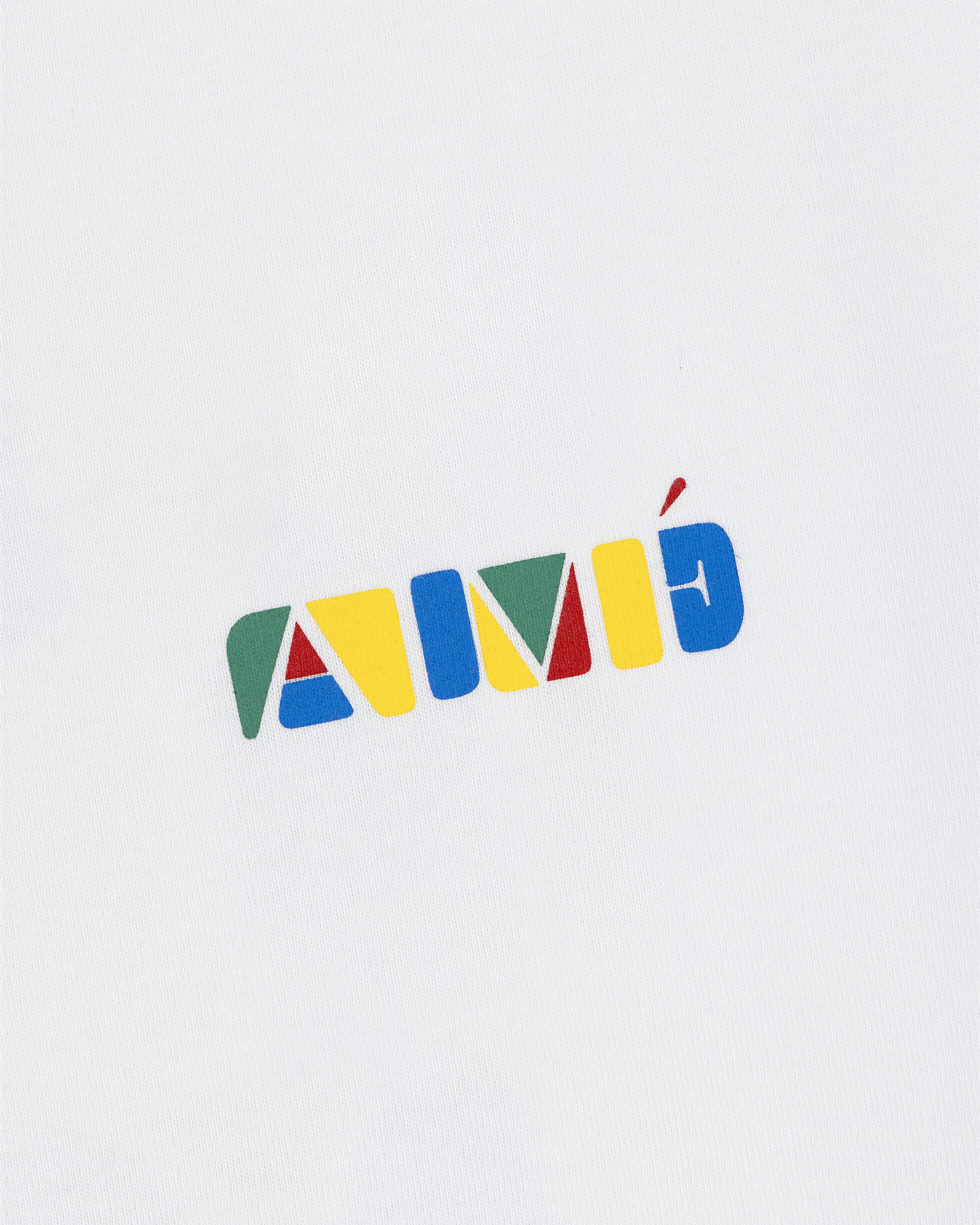 Stacked Logo Tee featuring colorful geometric letters spelling AMÉ on a white background.
