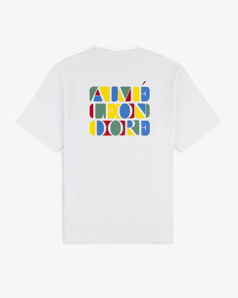 Stacked Logo Tee: White T-shirt with colorful geometric AIMÉ LEON DORE lettering on the back.