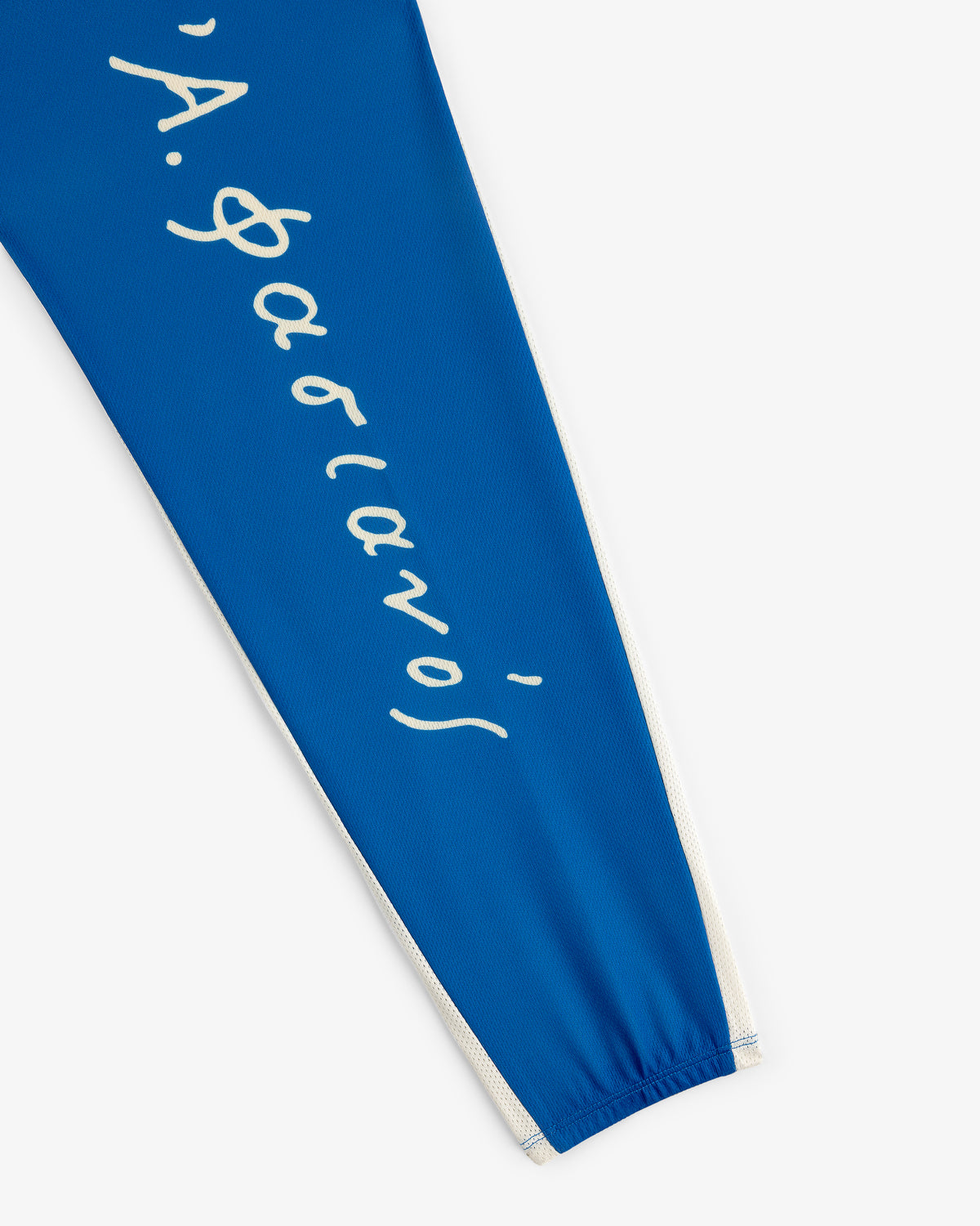 Fassianos Half-Zip Cycling Jersey: blue sleeve with white script text and a white side stripe.