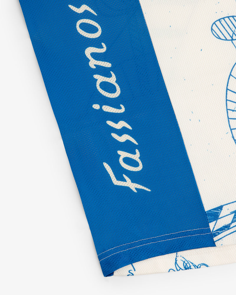 Close-up of the Fassianos Half-Zip Cycling Jersey showing blue and white fabric with "Fassianos" in cursive.