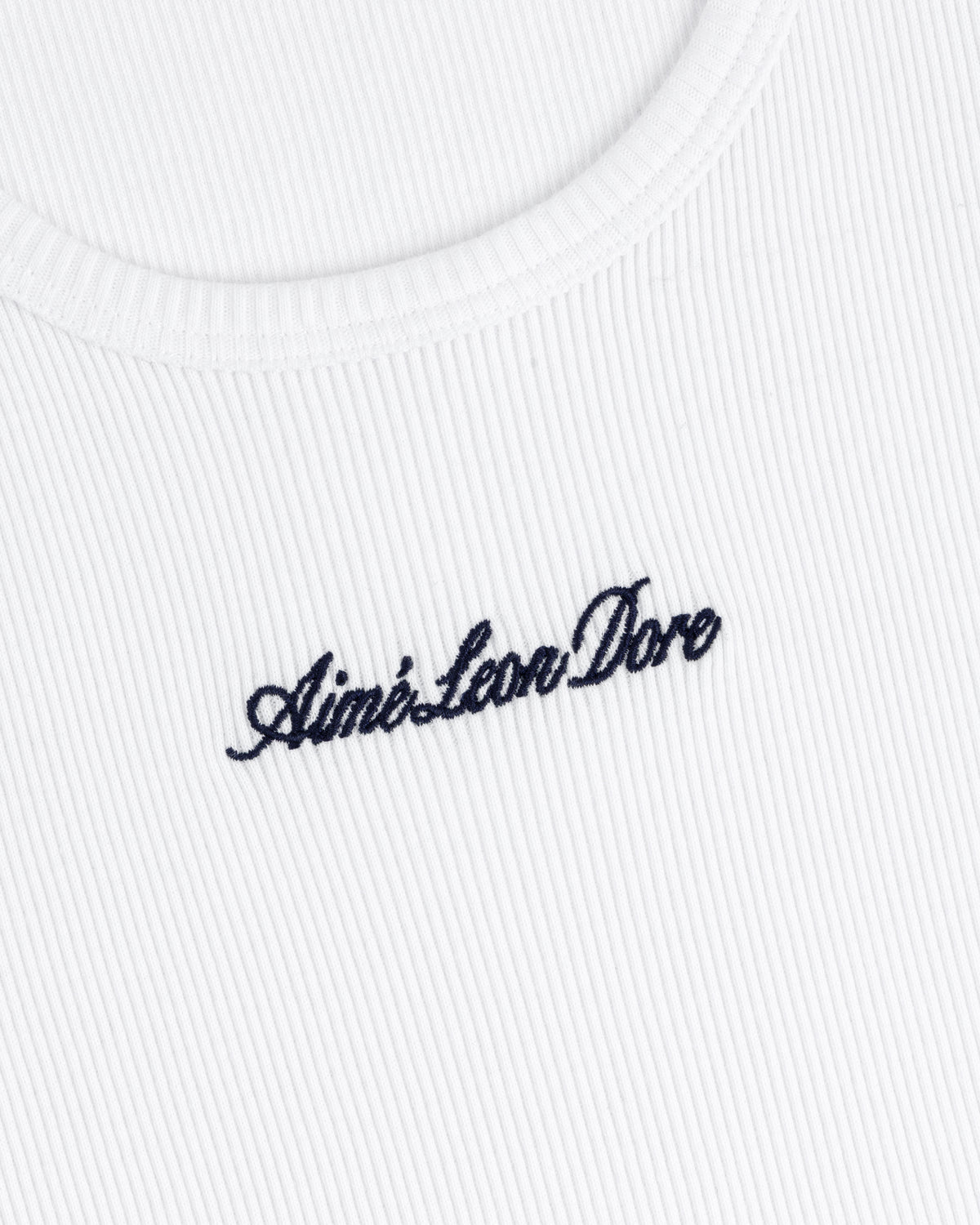 White ribbed Embroidered Logo Tank Top with Aimé Leon Dore in black cursive text on the chest.