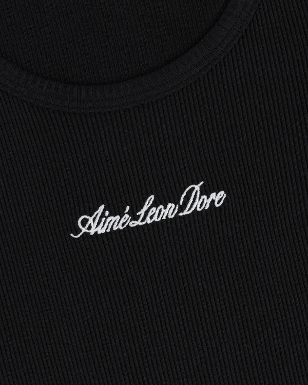 Close-up of black ribbed Embroidered Logo Tank Top with Aimé Leon Dore in white cursive text.