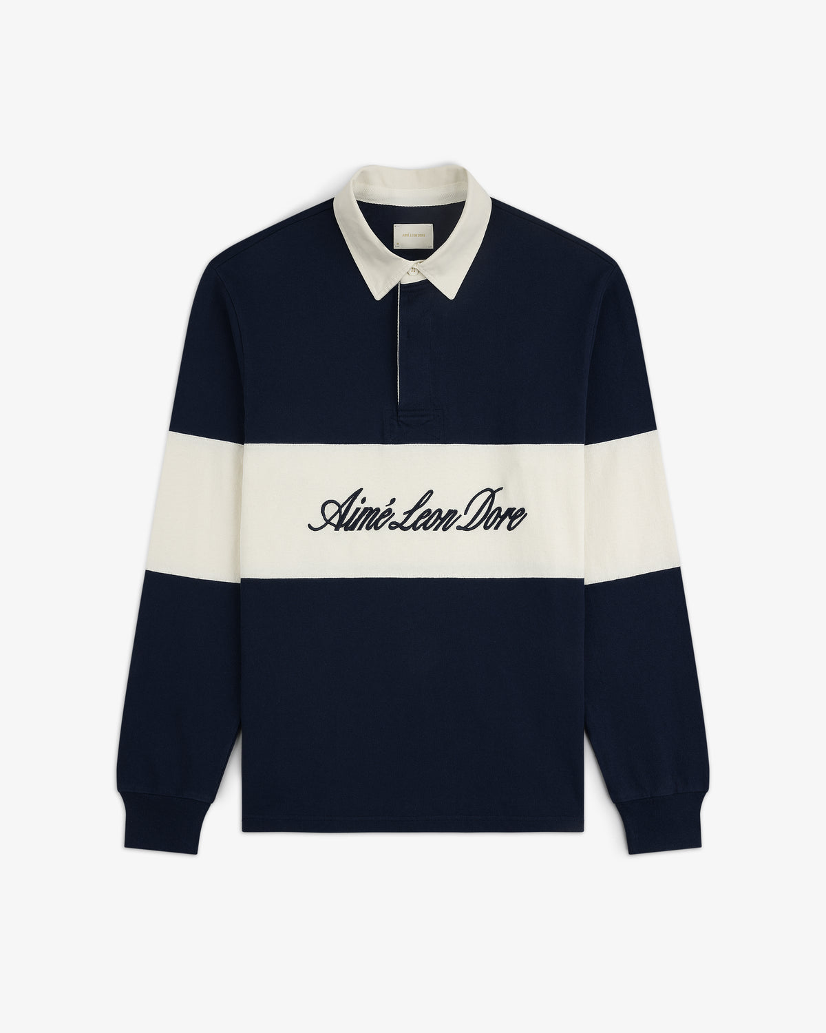 Script Paneled Rugby in navy and white with Aimé Leon Dore script logo on chest and a white collar.