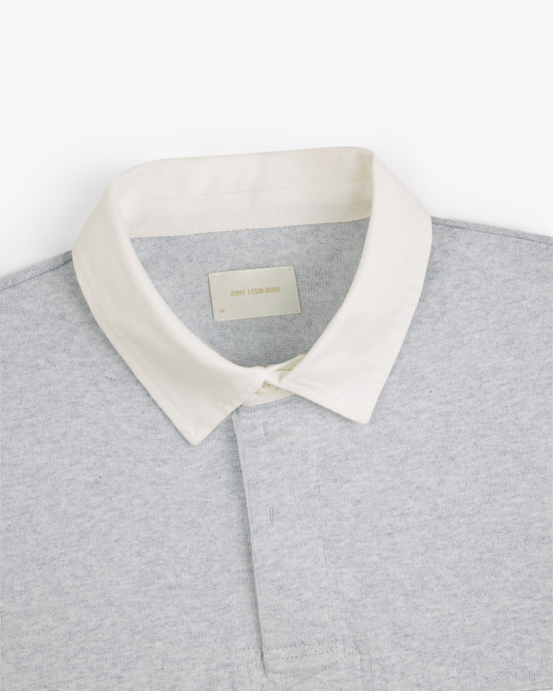 Script Paneled Rugby in light grey with a white collar, viewed from above on a white background.