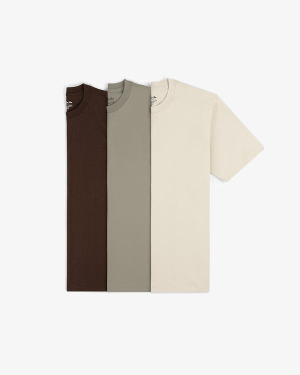 Multi-Color T-Shirt 3-Pack: brown, gray, and beige short-sleeve tees laid flat on a white background.