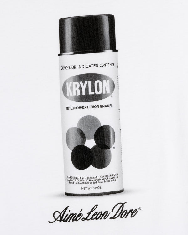 A black and white tee labeled "Krylon Pocket Tee" with Aimé Leon Dore written below.