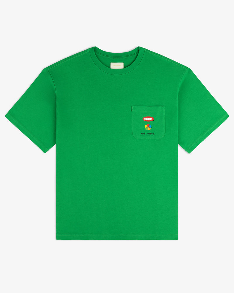 Krylon Pocket Tee in bright green with a front pocket, red and yellow flower graphic, and text above the pocket.