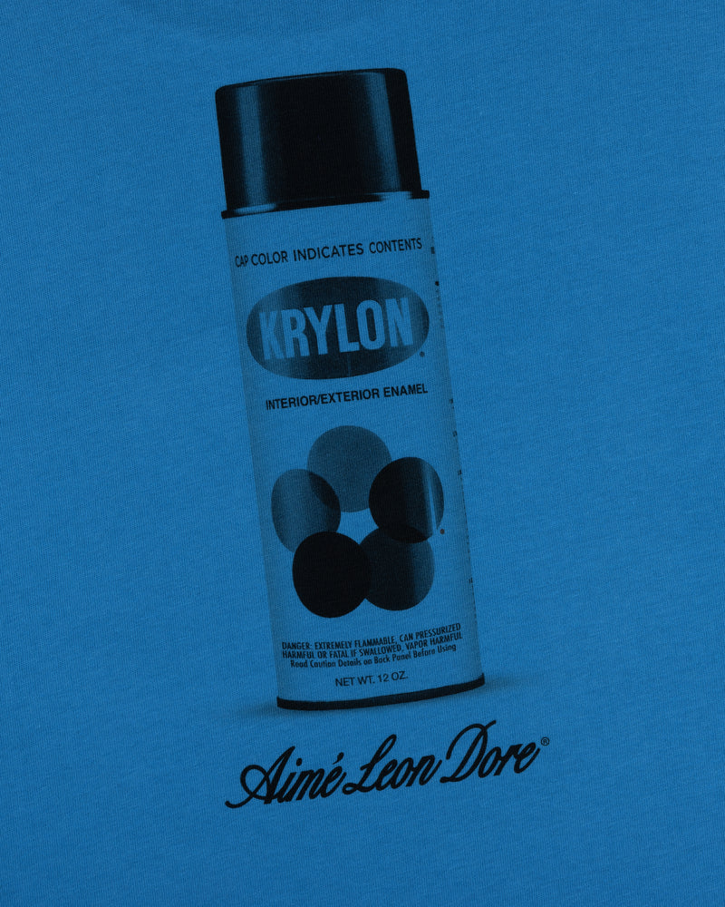 A Krylon Pocket Tee features a graphic of a Krylon spray paint can and the Aimé Leon Dore logo on blue.