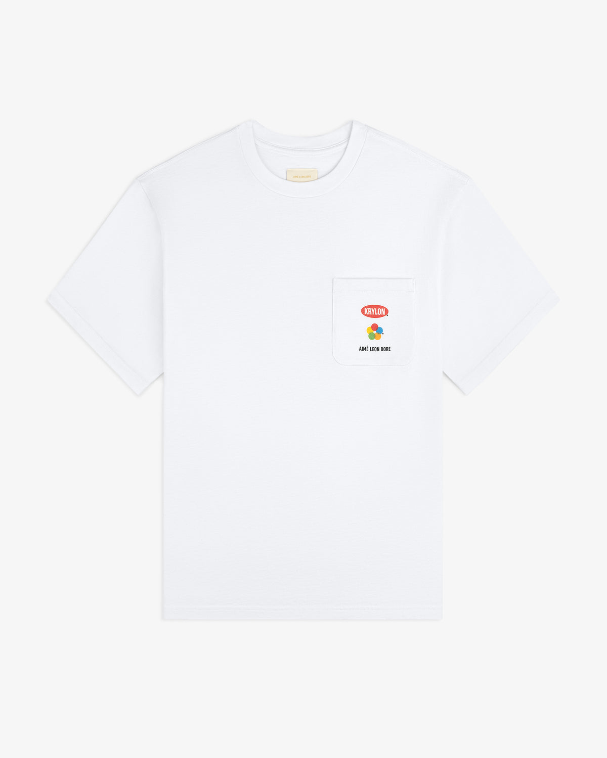 Krylon Pocket Tee: White short-sleeve shirt with small red and yellow graphic and text on the left chest pocket.