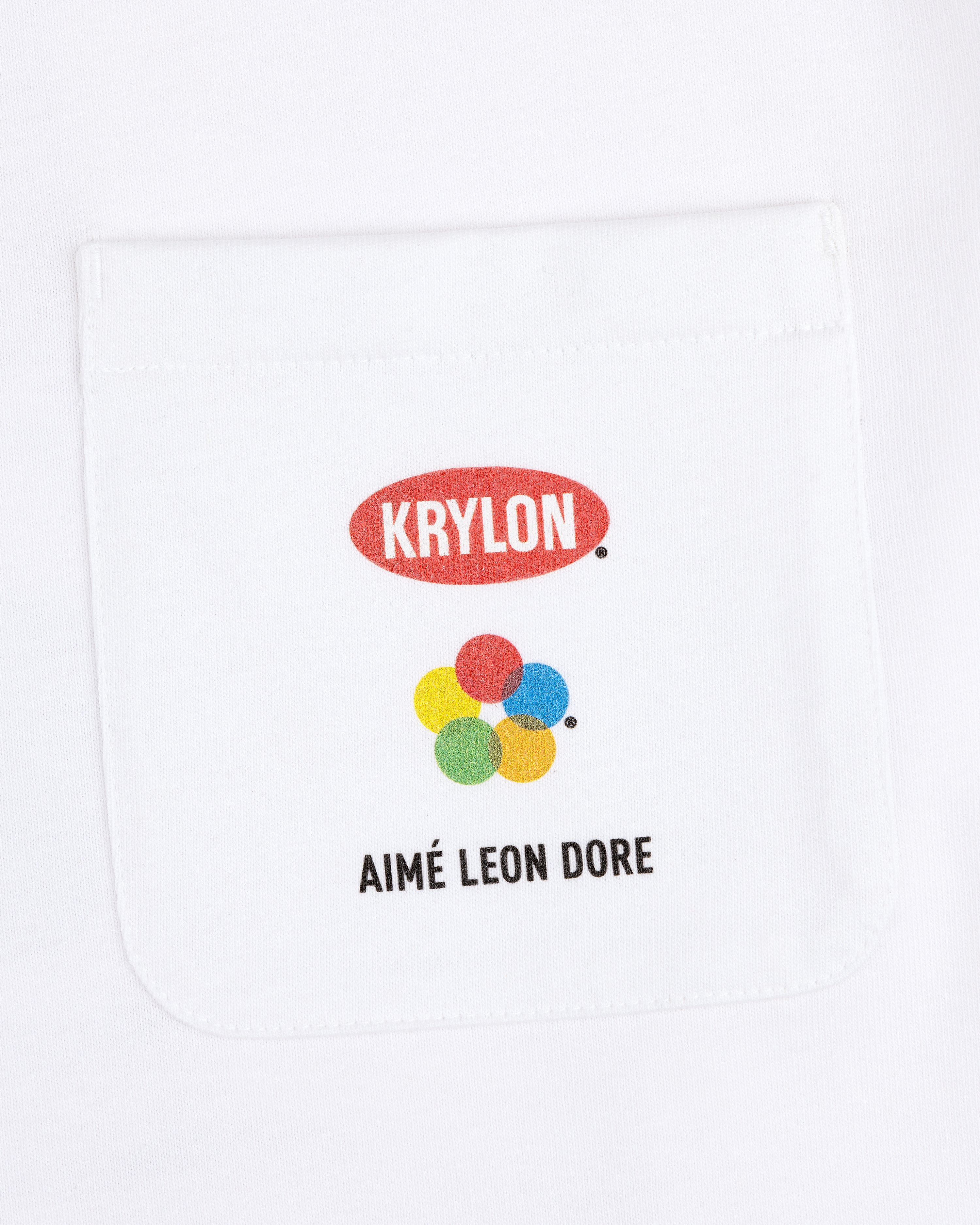 Krylon Pocket Tee: White shirt with pocket, KRYLON logo, colorful dots, and AIMÉ LEON DORE text below.