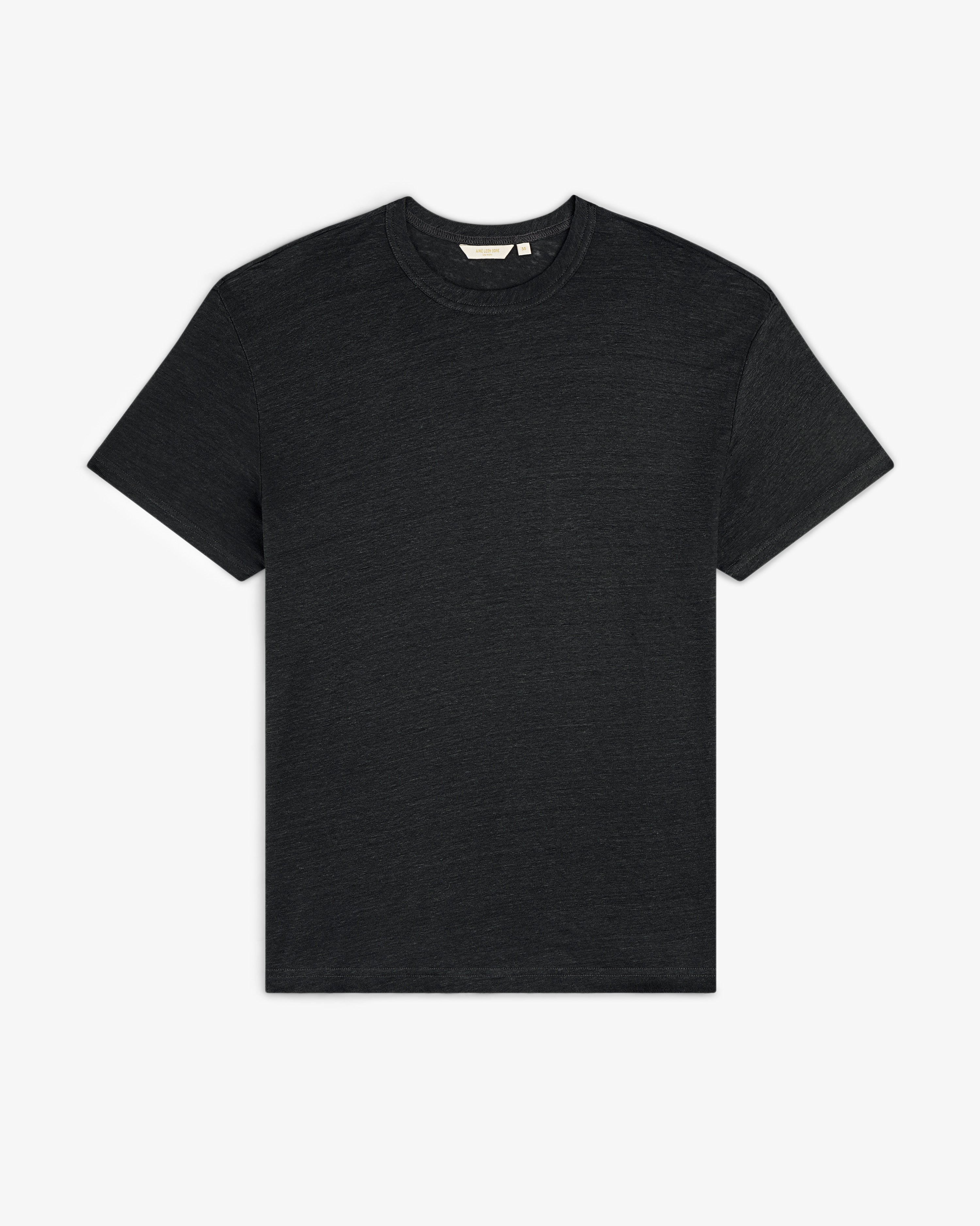 Linen Tee: plain black short-sleeve crew neck t-shirt laid flat on a white background.