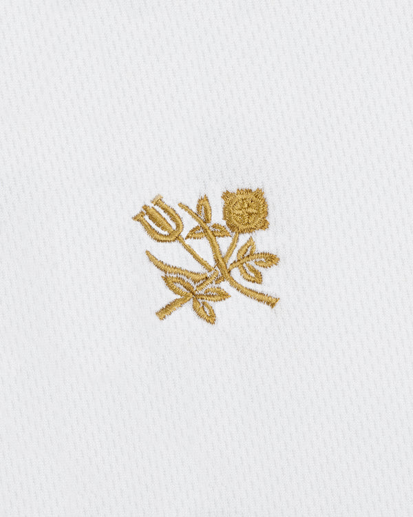 Gold embroidered rose & tulip with leaves on white ALD / Technics Soccer Jersey.