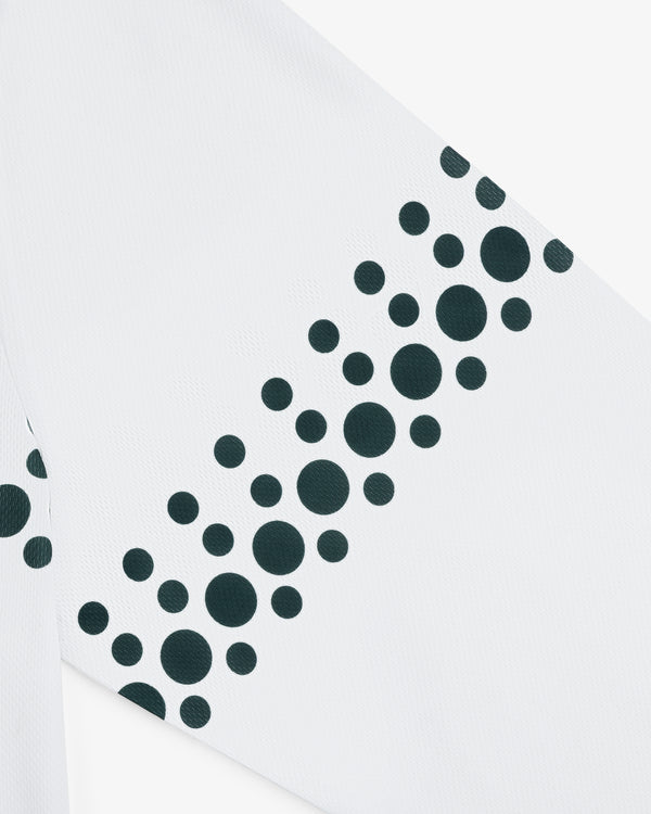 ALD / Technics Soccer Jersey features white fabric with a diagonal cluster of black dots in various sizes.