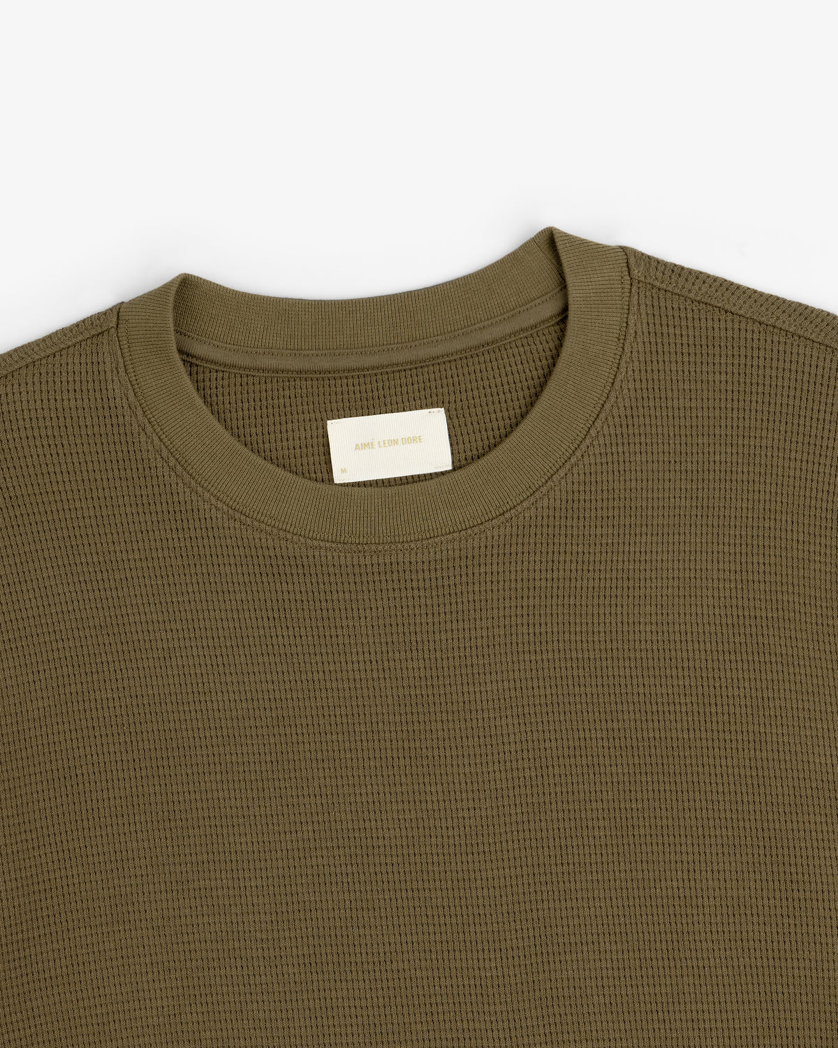 Olive green Long-Sleeve Waffle Thermal with a crewneck and visible neck label, laid flat on white background.