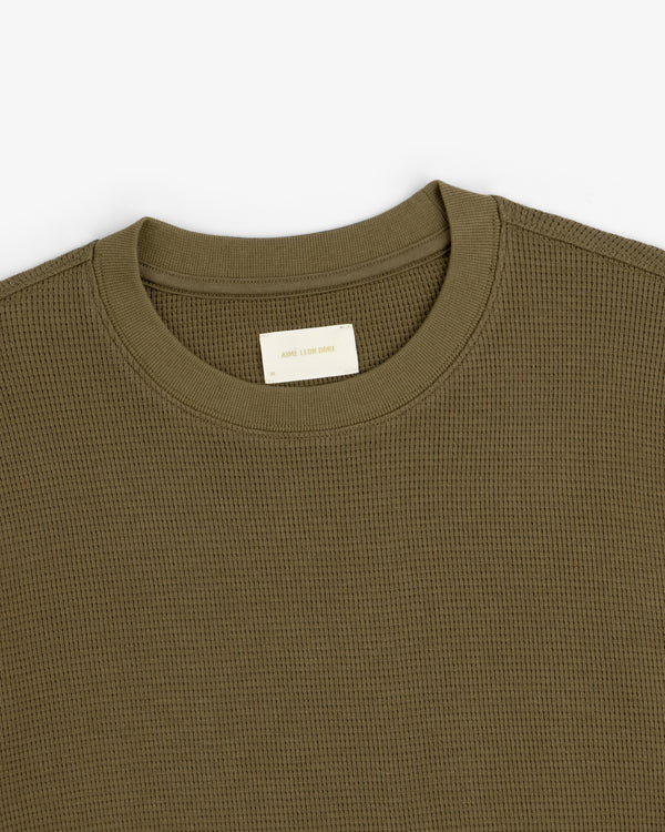 Olive green Long-Sleeve Waffle Thermal with a crewneck and visible neck label, laid flat on white background.