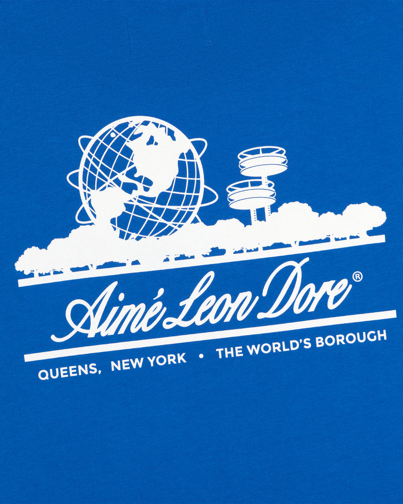 White graphic of globe, towers & trees with “Aimé Leon Dore” on blue ALD / LA Dodgers Unisphere Tee.
