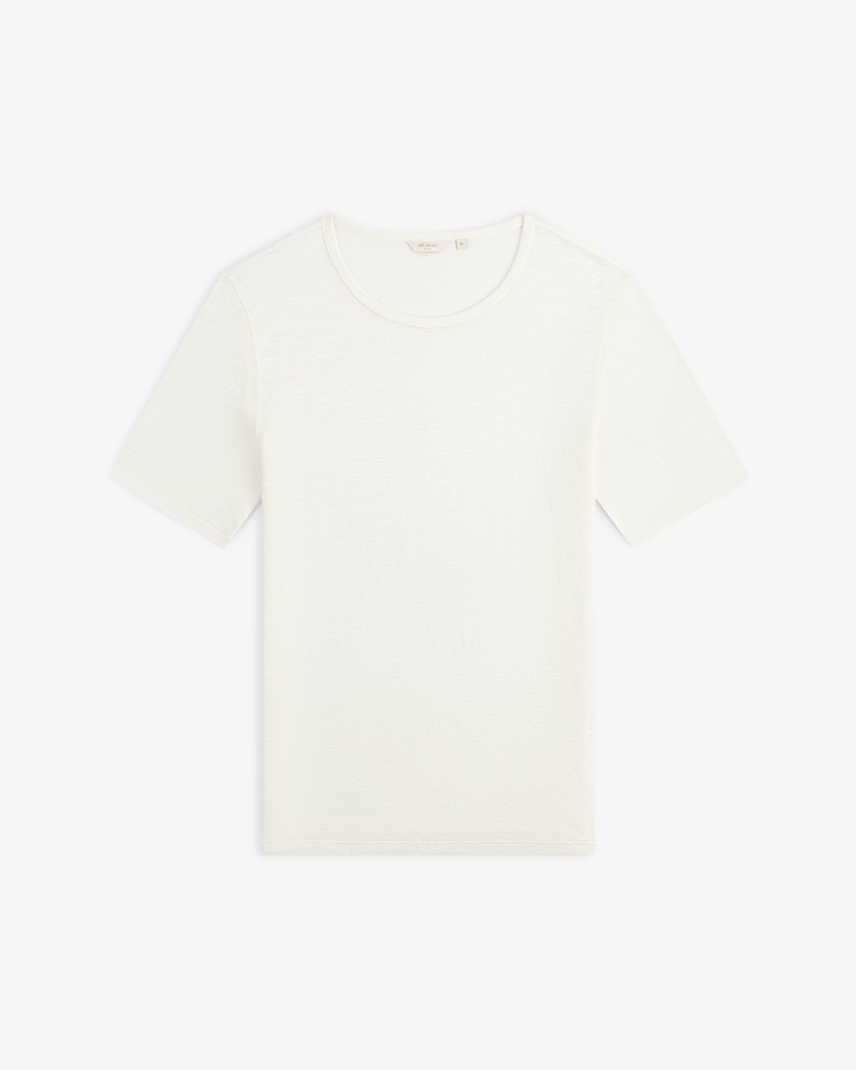 The Linen Tee, a plain white short-sleeve crew neck, is laid flat on a white background.