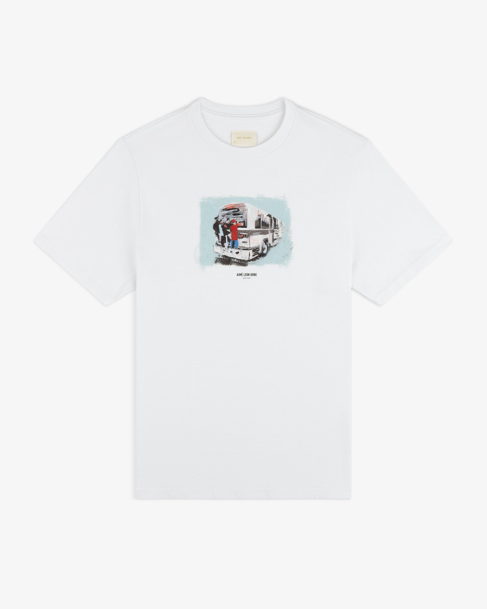 Mesaikos Commuter Tee: White shirt with a small truck and two people graphic plus text on the front.
