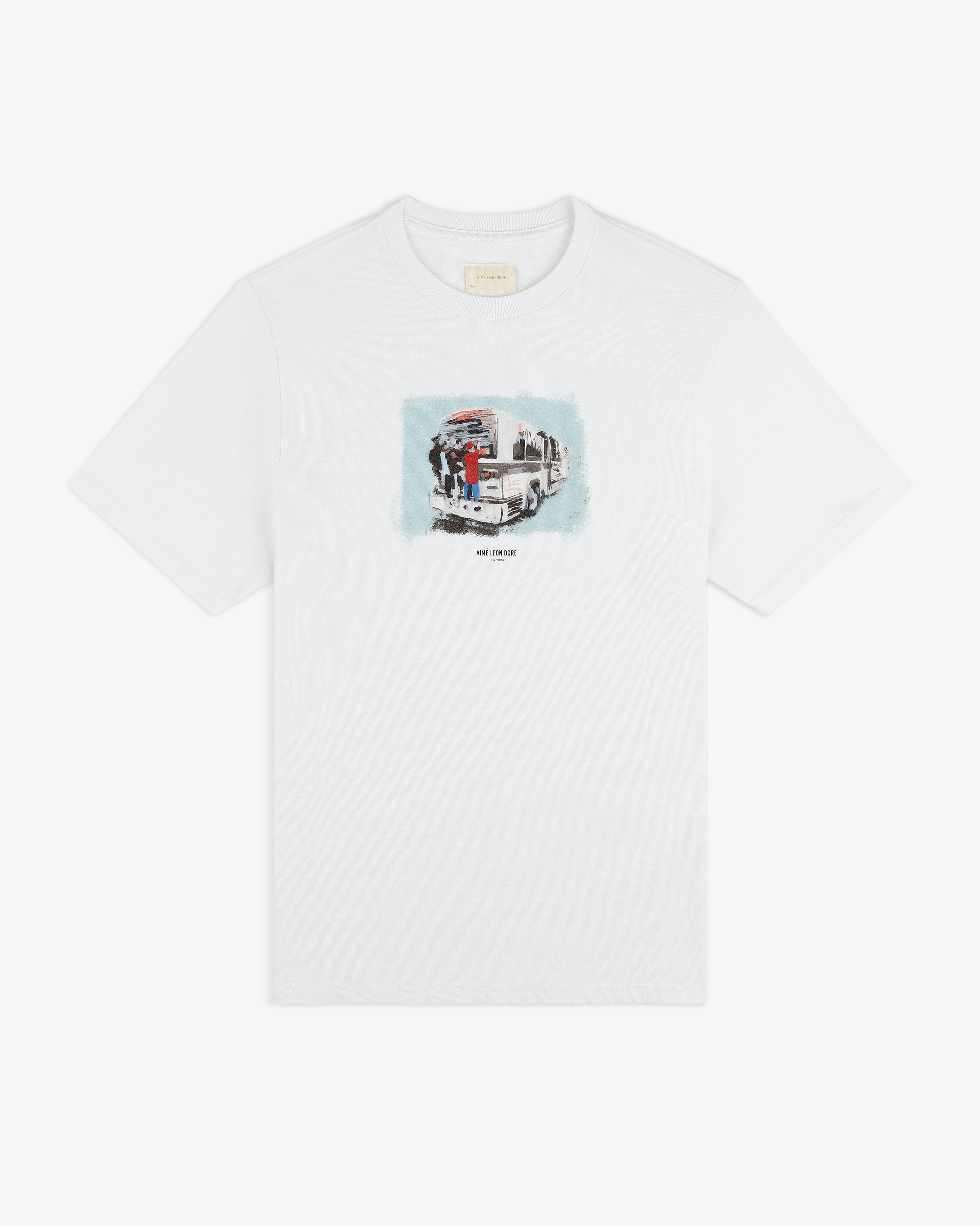 Mesaikos Commuter Tee: White shirt with a small truck and two people graphic plus text on the front.