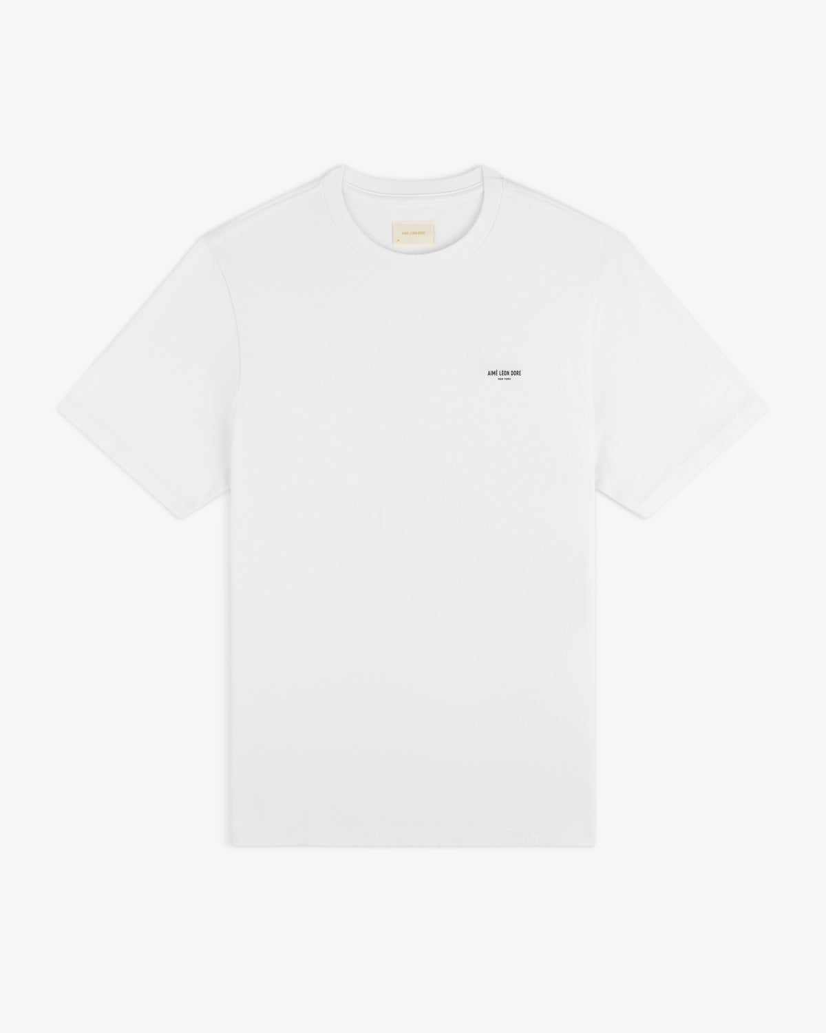 Mott Street Tee: plain white short-sleeve shirt with a small black logo printed on the left chest.
