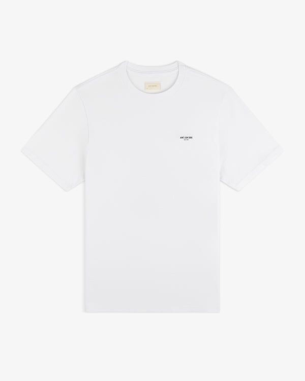 Mott Street Tee: plain white short-sleeve shirt with a small black logo printed on the left chest.