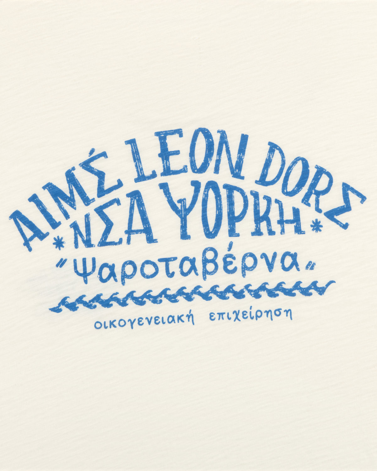 The Taverna Tee features blue Greek-style text reading Aims Leon Dore Νέα Υόρκη ‘Ψαροταβέρνα’ on a white background.