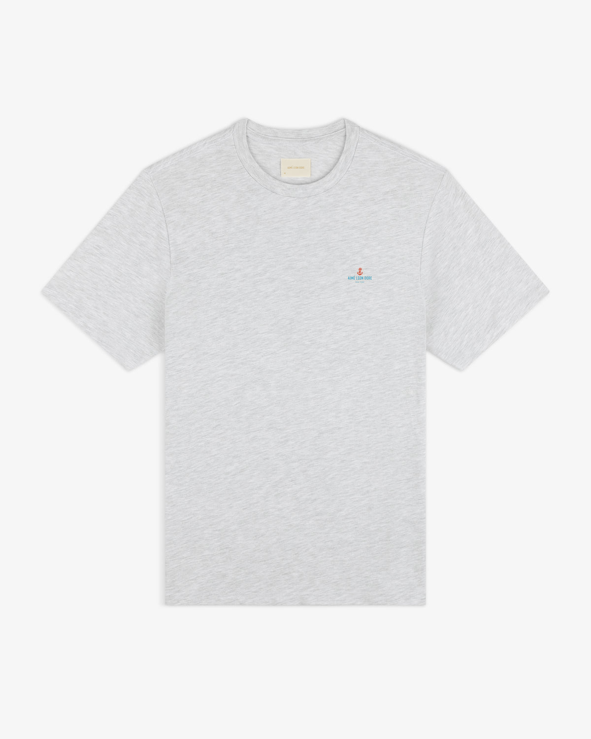 Coastal Flag Tee: light gray short-sleeve t-shirt with small embroidered logo on left chest, shown on white background.