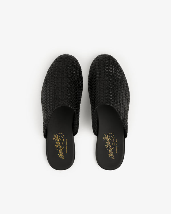 Leather Raffia Mule in black with gold logo text on the insole, shown from above on a white background.