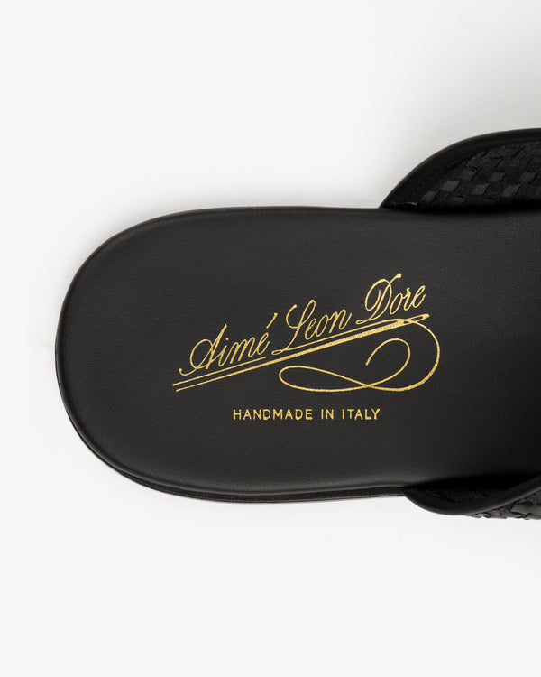 Leather Raffia Mule sandal with Aimé Leon Dore and Handmade in Italy written in gold script on the footbed.