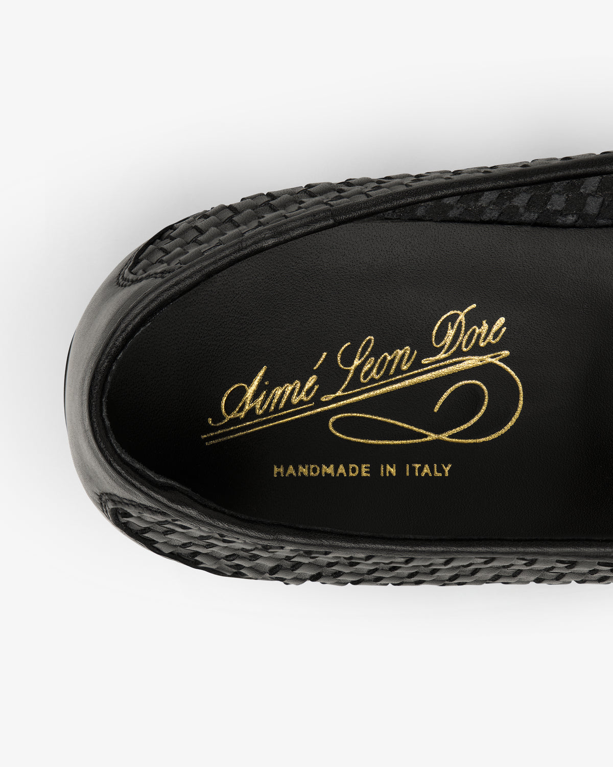 Black Leather Raffia Loafer featuring "Aimé Leon Dore" and "Handmade in Italy" in gold script on the insole.