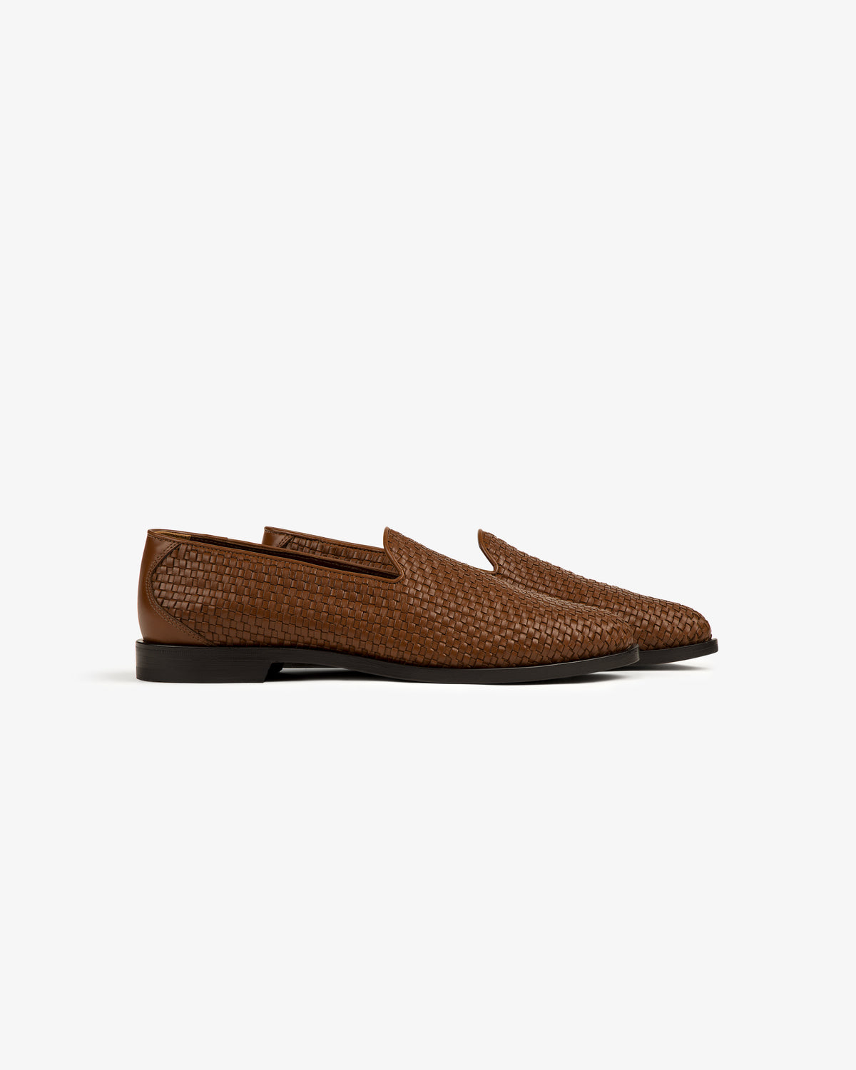 Leather Raffia Loafer in brown with a low heel and almond toe, shown in side view on a white background.