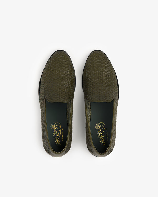 Leather Raffia Loafer in olive green with textured finish, dark insoles, and gold branding viewed from above on white.