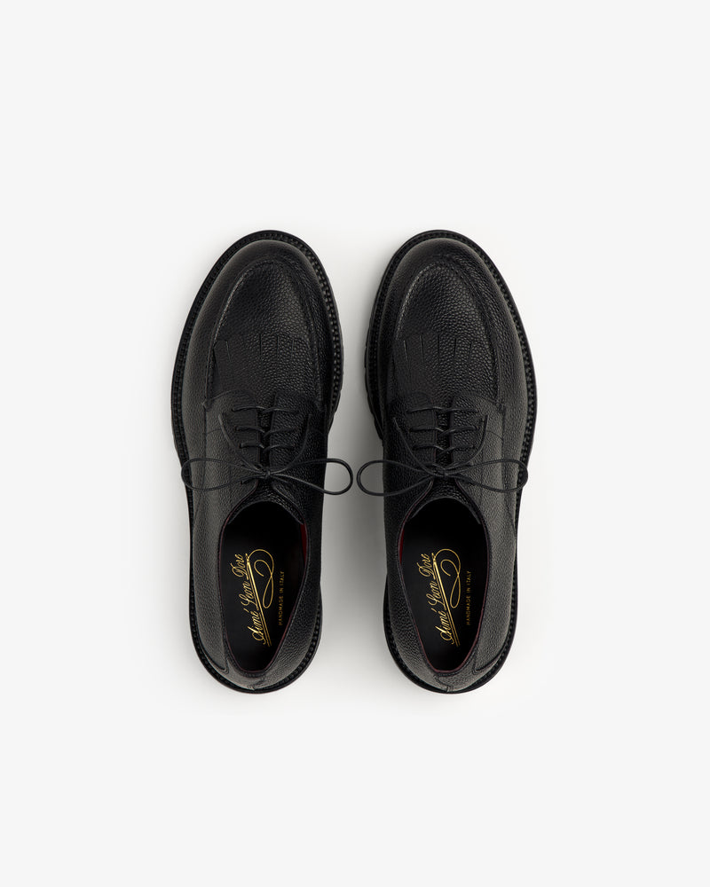 Leather Lug Sole Derby shoes with laces, viewed from above on a white background.