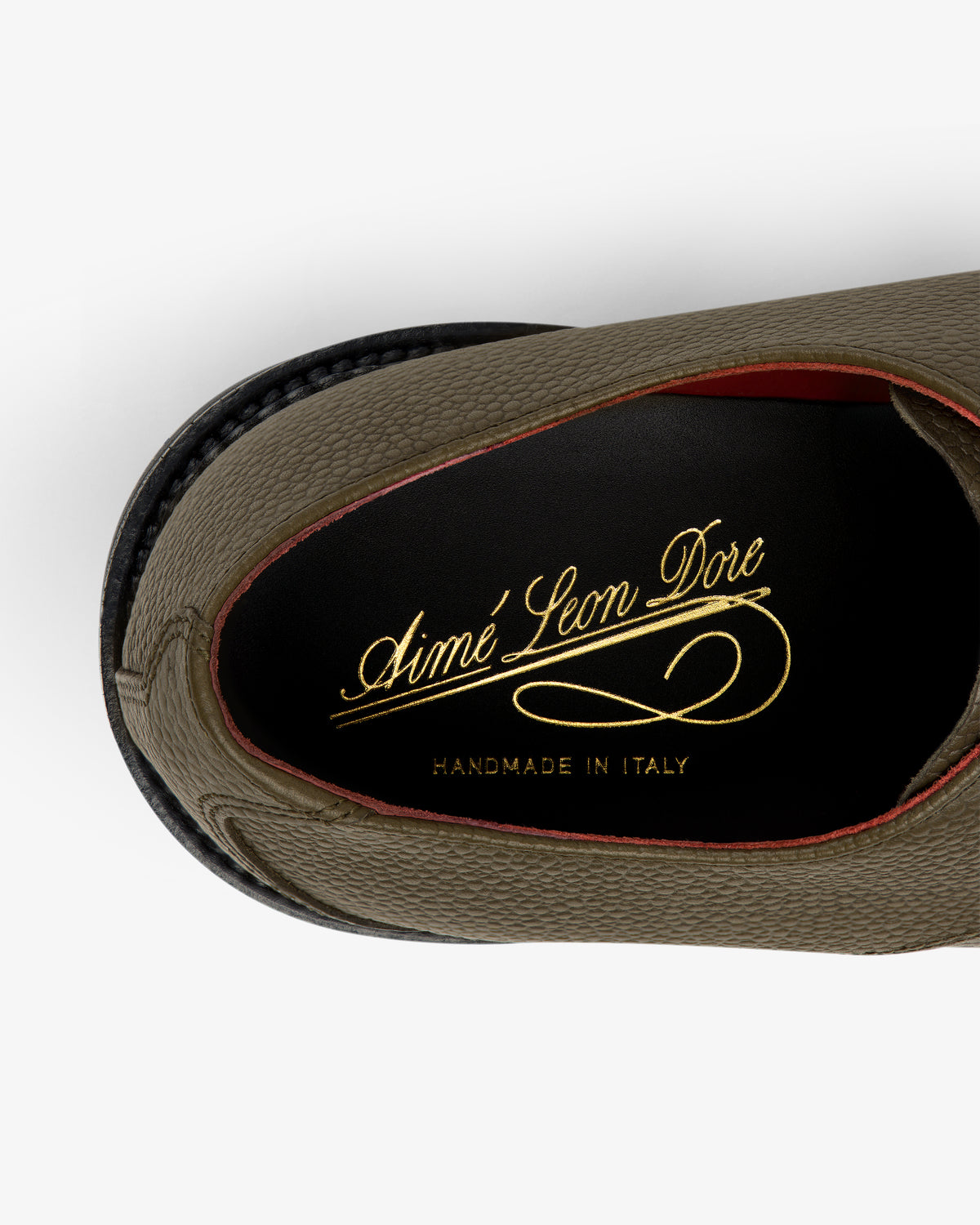 Top view of Leather Lug Sole Derby with Aimé Leon Dore Handmade in Italy in gold on the black insole.