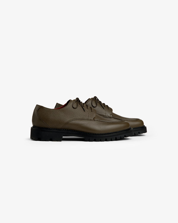 Leather Lug Sole Derby shoes in olive green lace-up style with black lug soles.