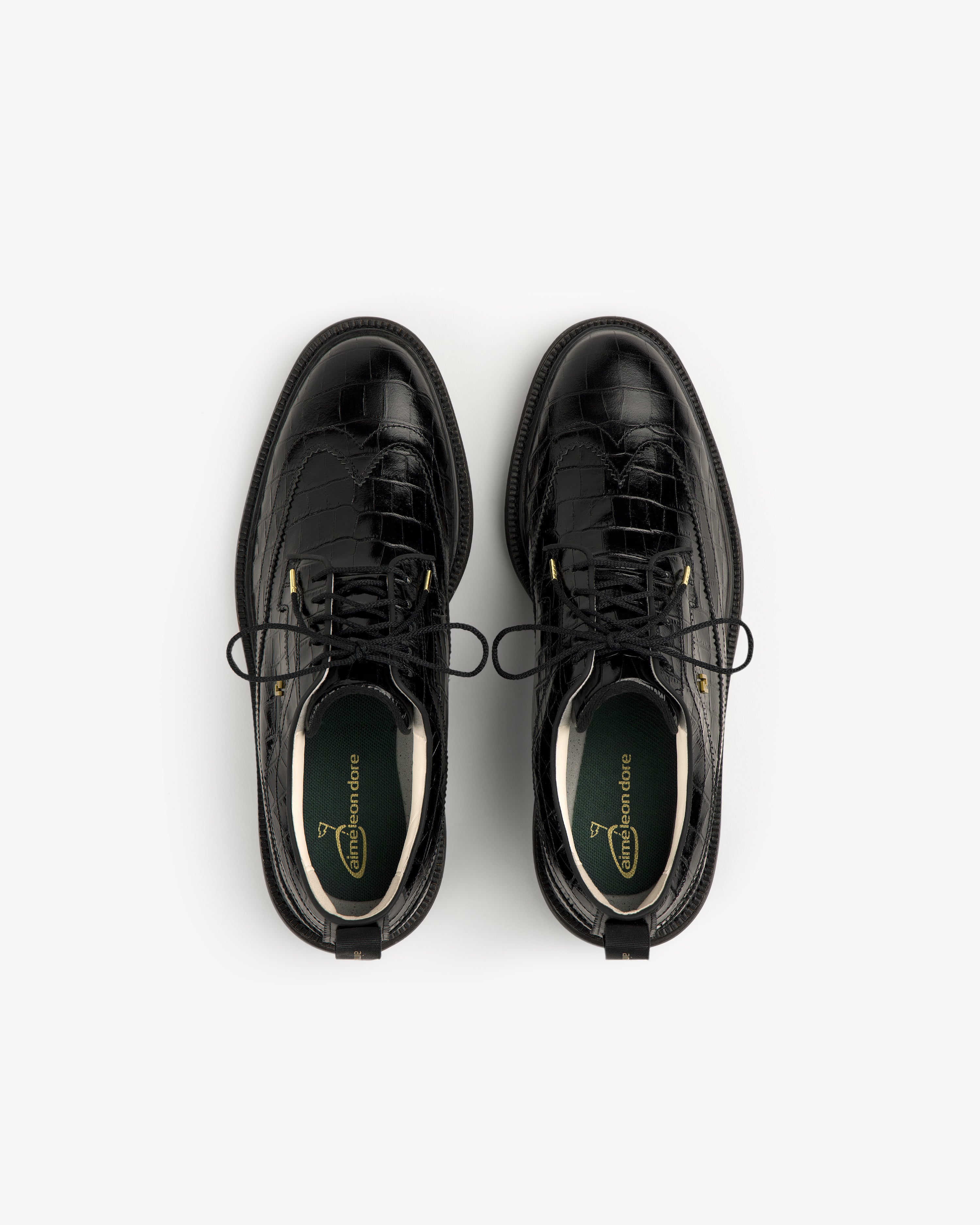ALD / Footjoy Croc-Embossed Premiere Series Marquis black leather dress shoes, top view on white background.