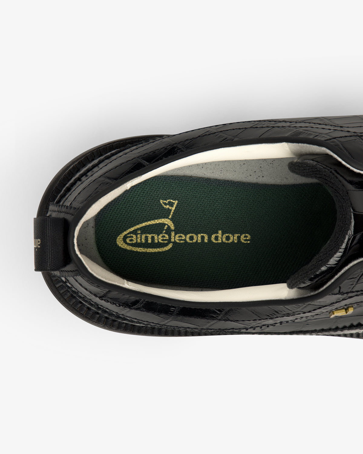 Top view of the ALD / Footjoy Croc-Embossed Premiere Series Marquis showing a green insole with gold logo.