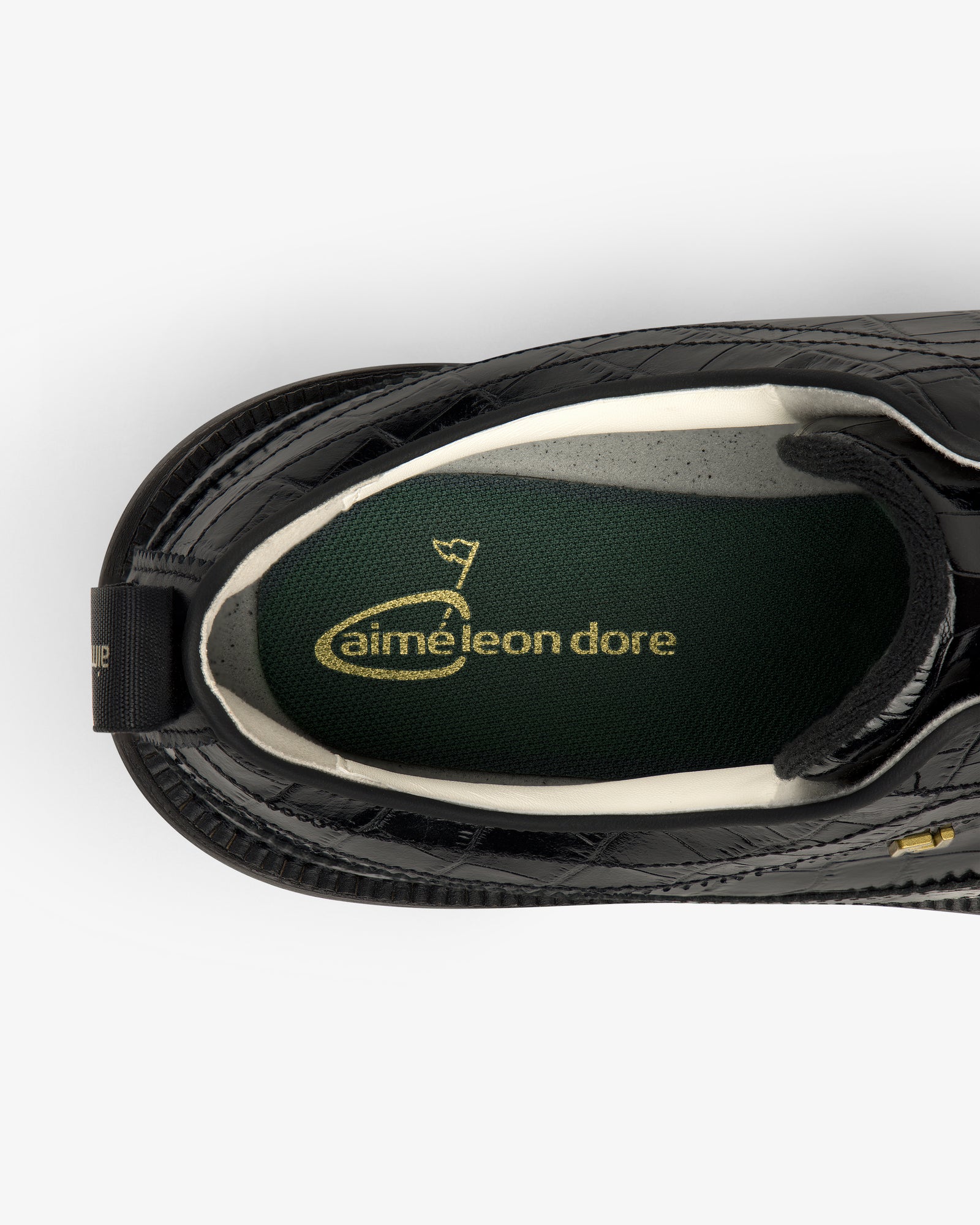 Top view of the ALD / Footjoy Croc-Embossed Premiere Series Marquis showing a green insole with gold logo.