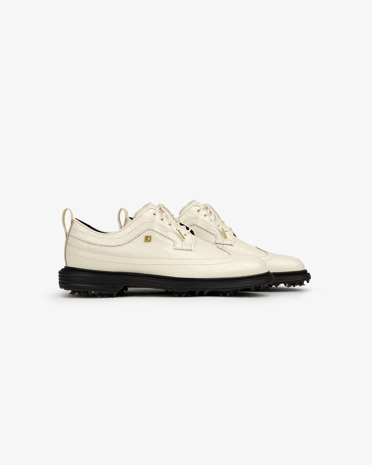ALD / Footjoy Croc-Embossed Premiere Series Marquis off-white lace-up shoes with black soles, side view.