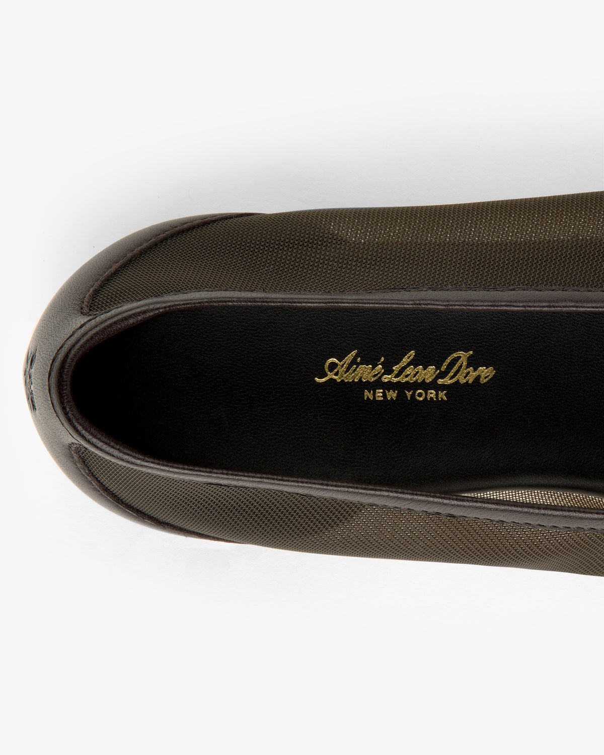 Top view of Mesh Ballet Flat with Aimé Leon Dore NEW YORK in gold on the black insole.